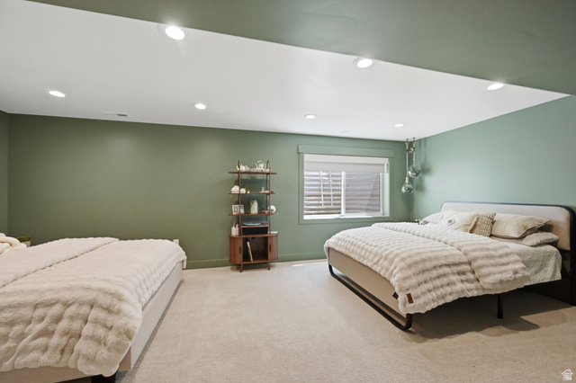 57 McCall Ln. Farmington, UT 84025 - Photo 28 of 36 Spacious room may be family room featuring muted green walls and a recessed ceiling with integrated lighting