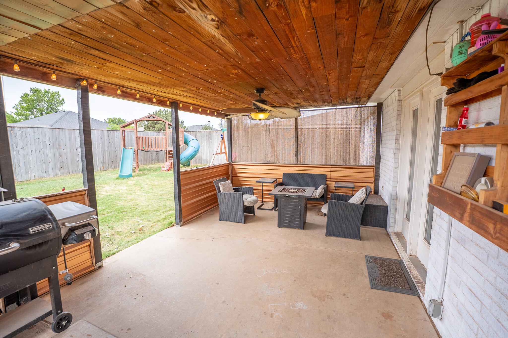 1609 78th Street Lubbock, TX 79423 - Photo 30 of 36 a outdoor space with patio lots of furniture and garden view