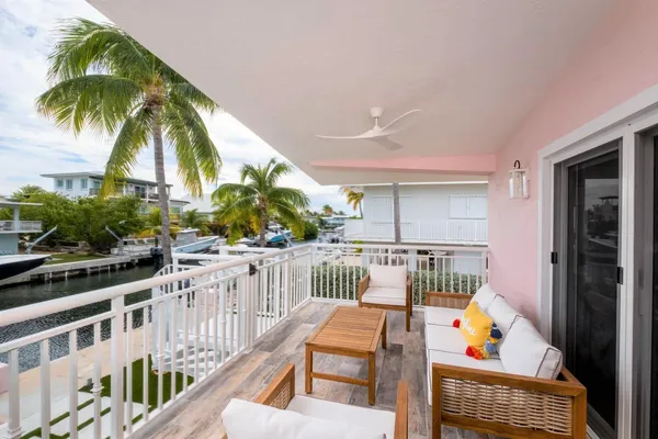 a view of living room with furniture and flat screen tv