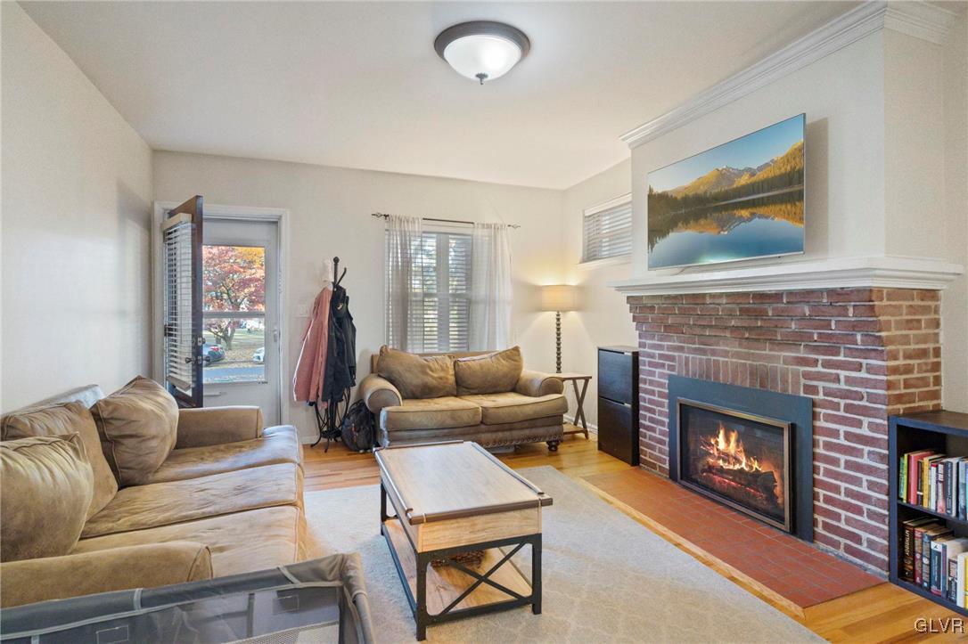 627 9th Avenue Bethlehem, PA 18018 - Photo 11 of 29 a living room with furniture and a fireplace