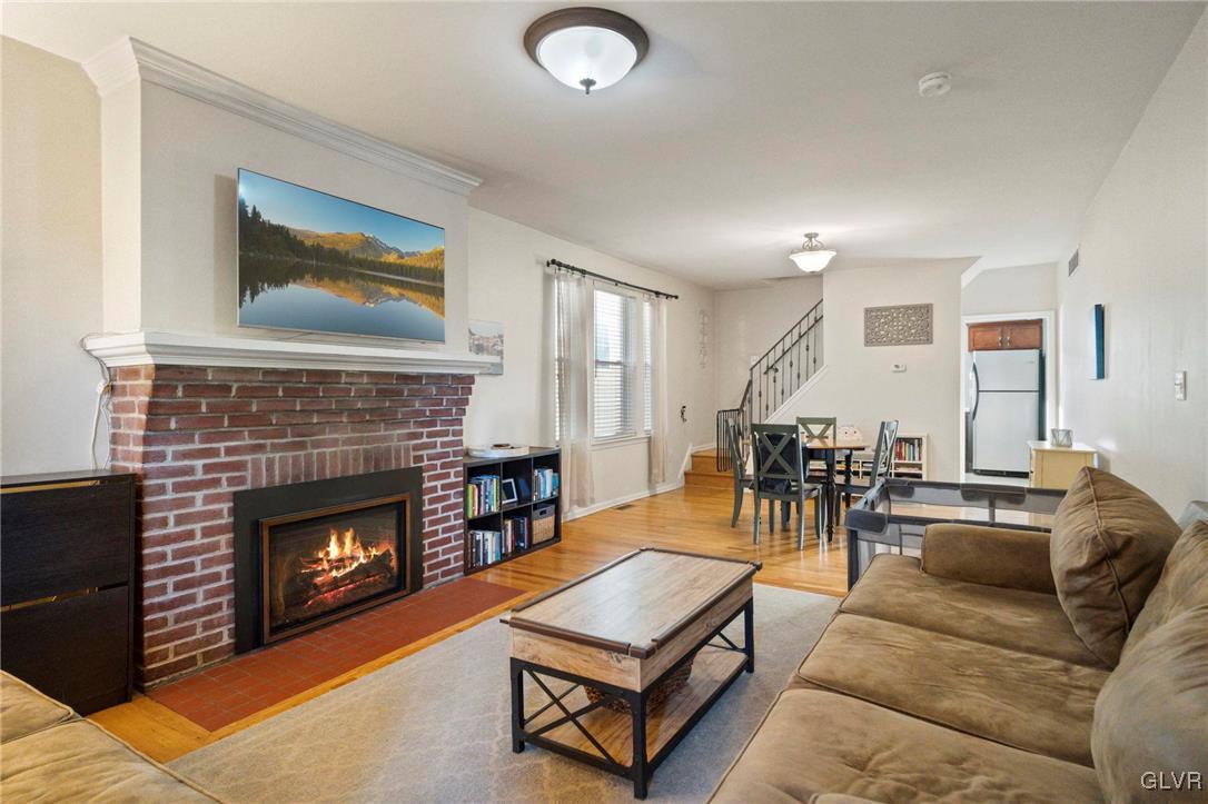 627 9th Avenue Bethlehem, PA 18018 - Photo 12 of 29 a living room with furniture and a fireplace