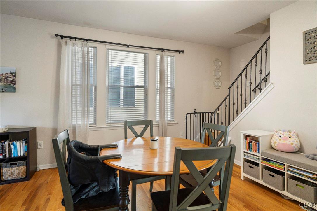 627 9th Avenue Bethlehem, PA 18018 - Photo 13 of 29 a view of a dining room with furniture and wooden floor