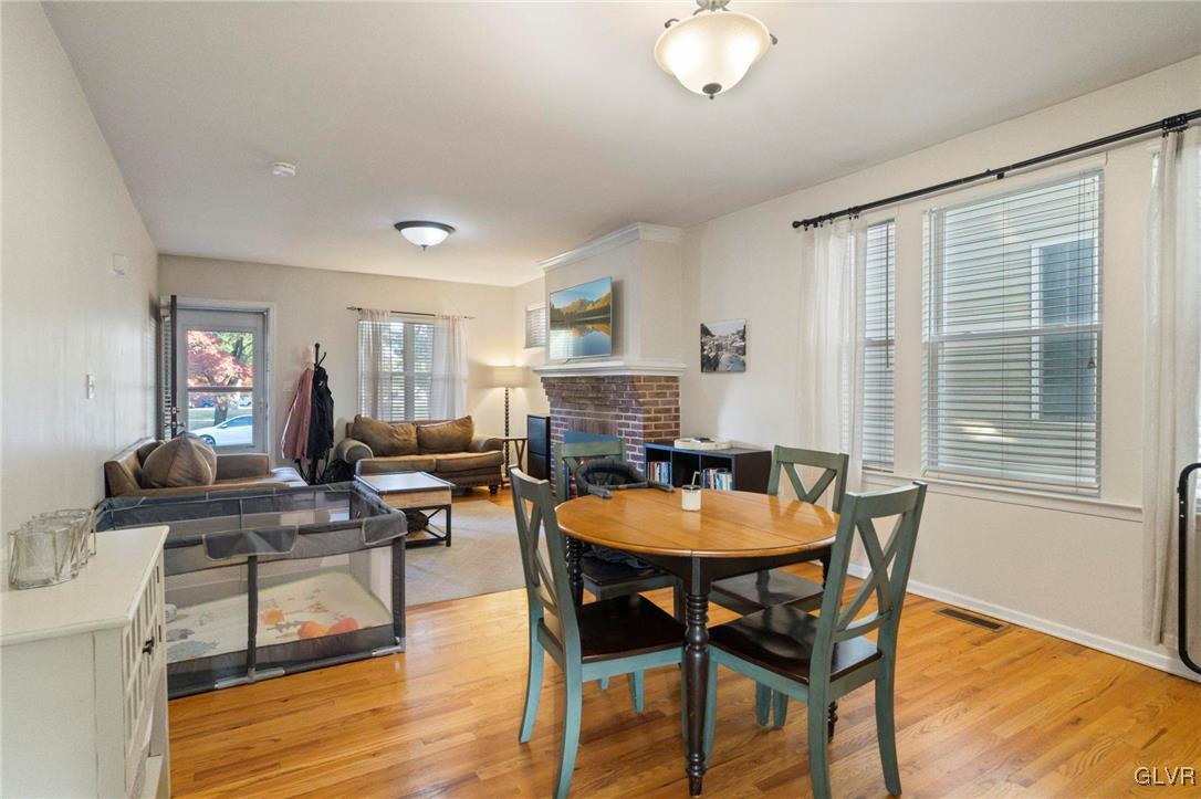 627 9th Avenue Bethlehem, PA 18018 - Photo 14 of 29 a dining room with furniture and wooden floor