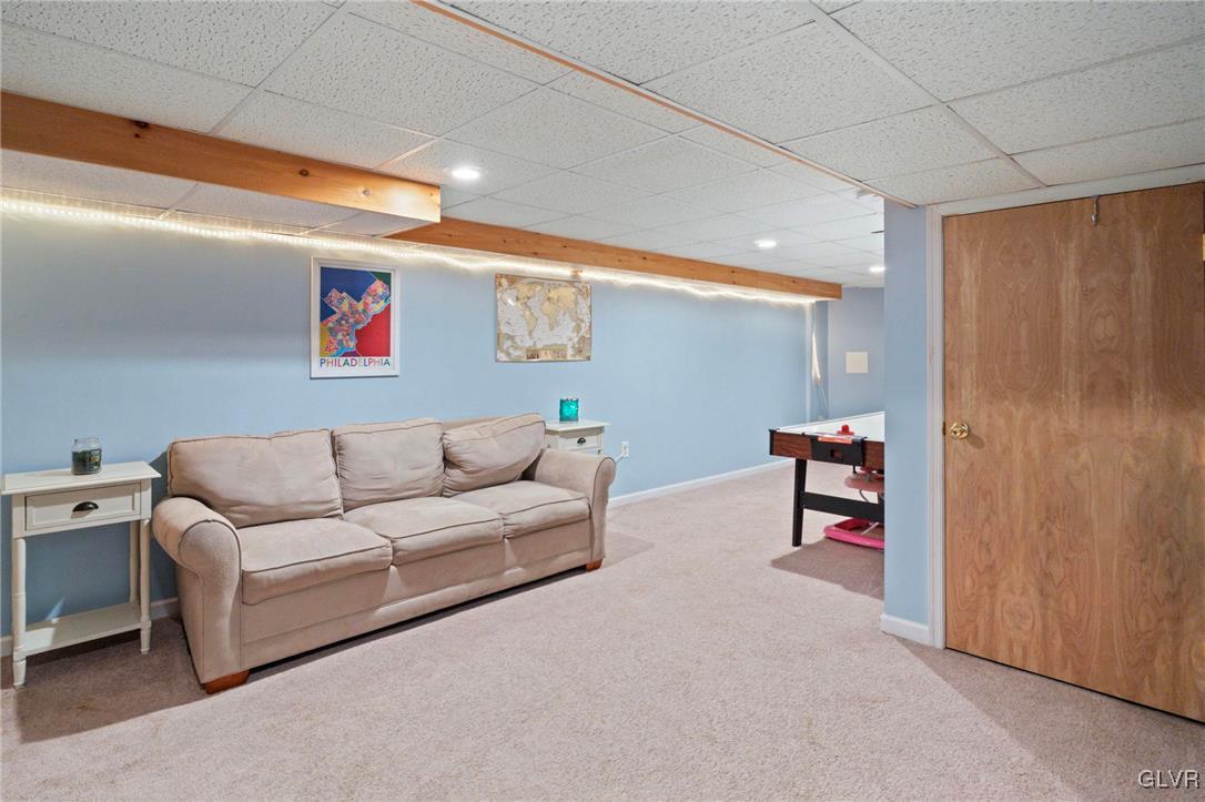627 9th Avenue Bethlehem, PA 18018 - Photo 17 of 29 a living room with furniture and a wall painting