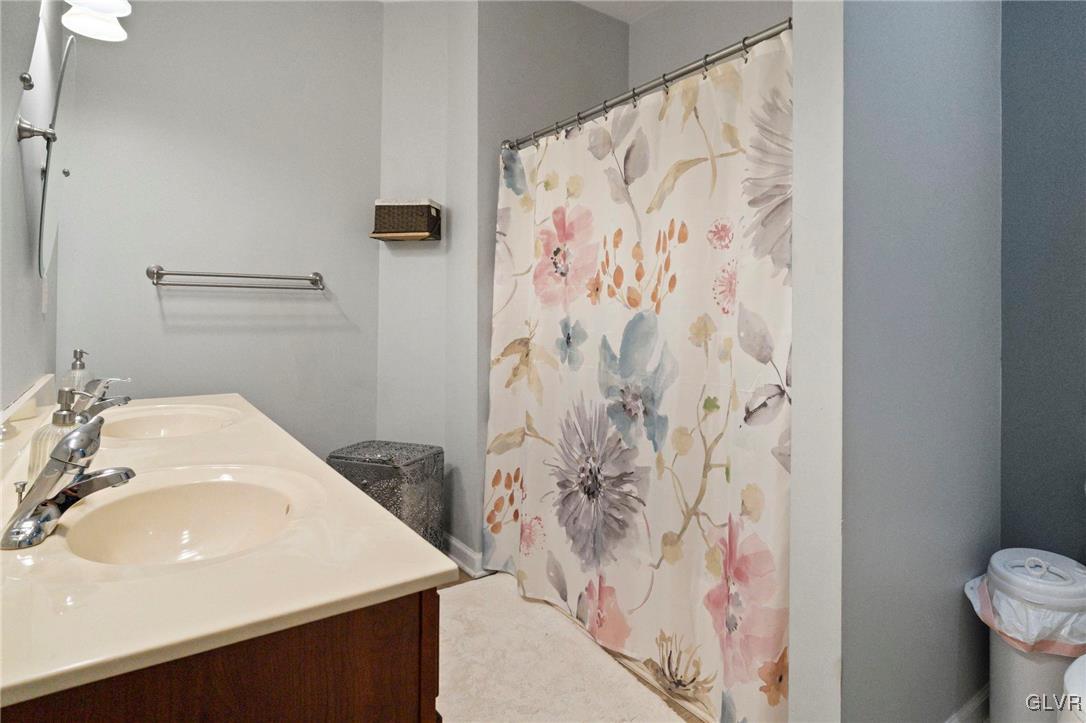 627 9th Avenue Bethlehem, PA 18018 - Photo 19 of 29 a bathroom with a sink and toilet