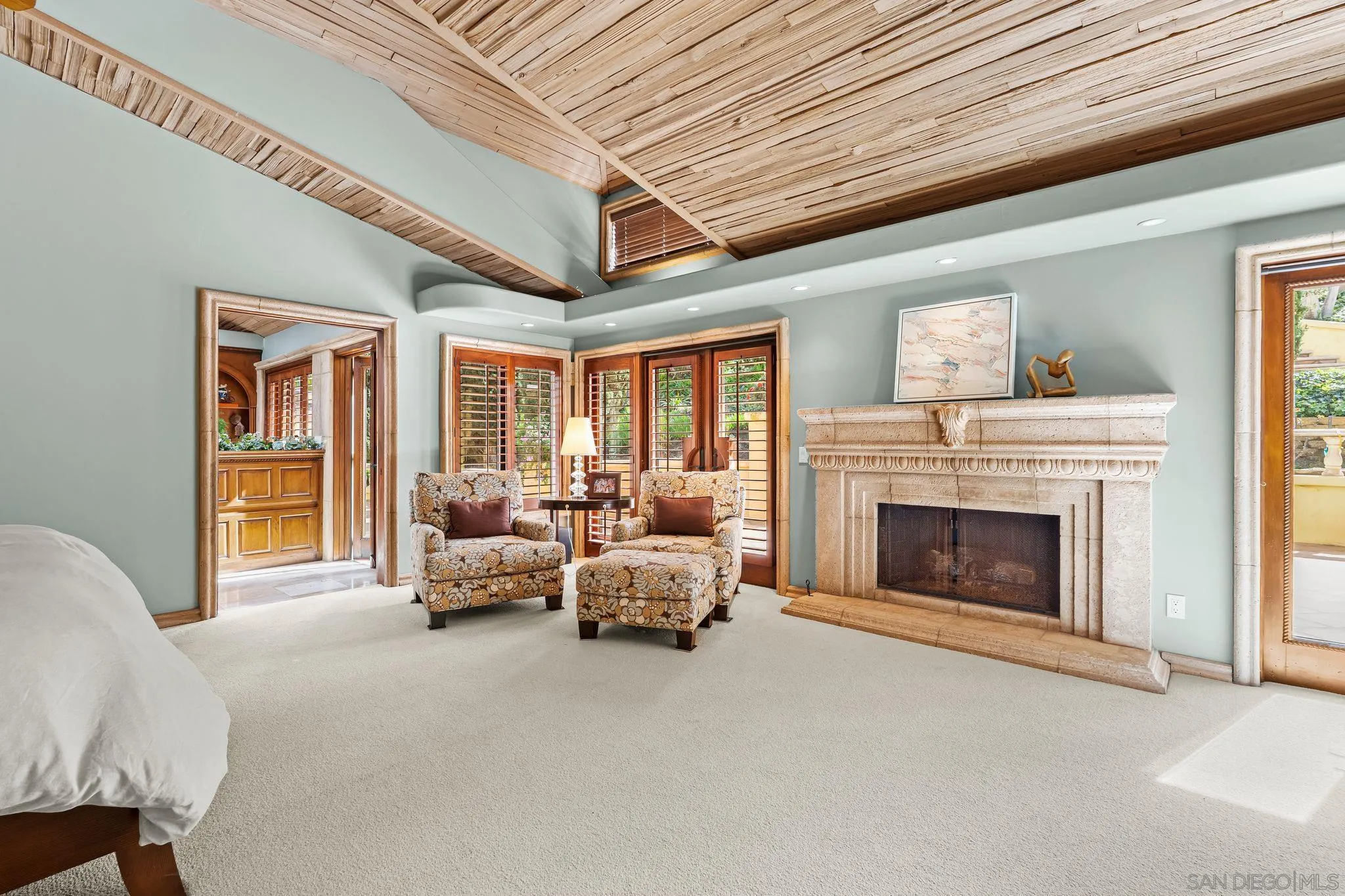 2969 Racetrack View Drive Del Mar, CA 92014 - Photo 23 of 59 a living room with furniture and a fireplace