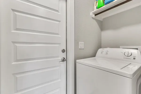a picture of a bathroom with mirror