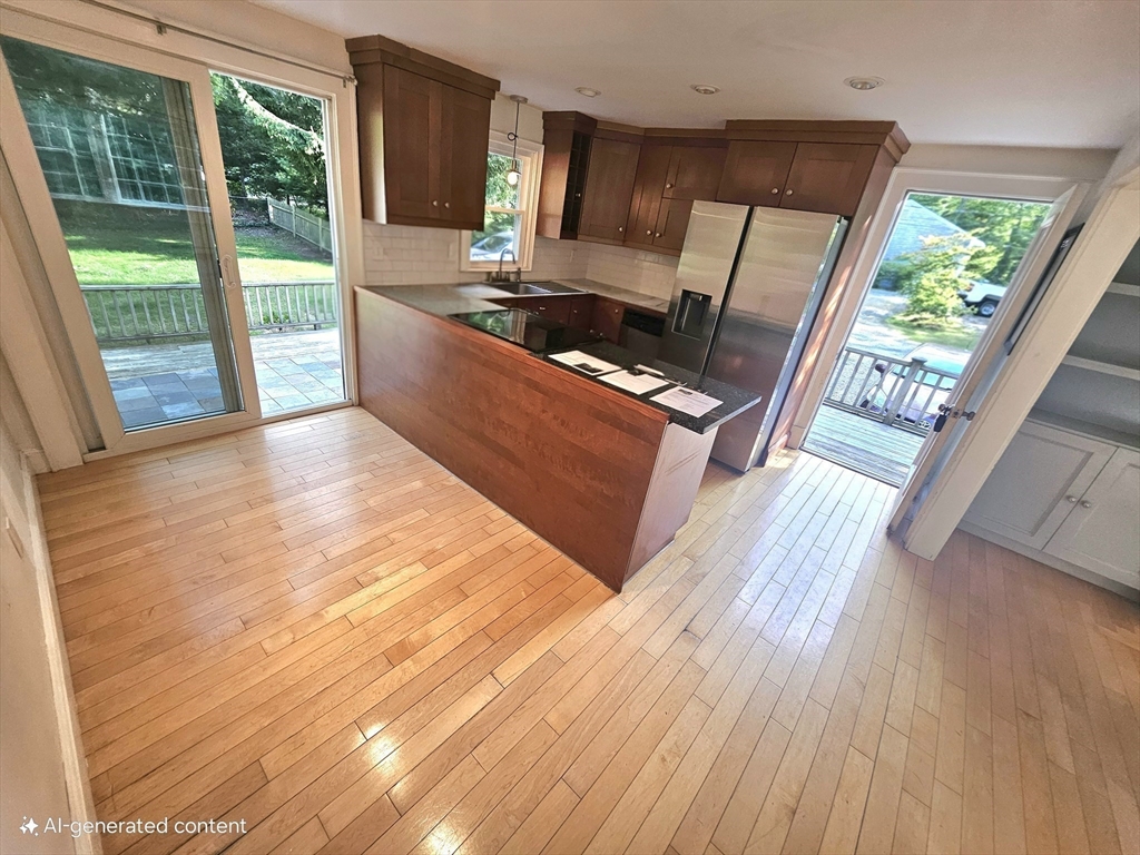 526 Skunknet Road Barnstable, MA 02632 - Photo 11 of 20 a living room with a large window
