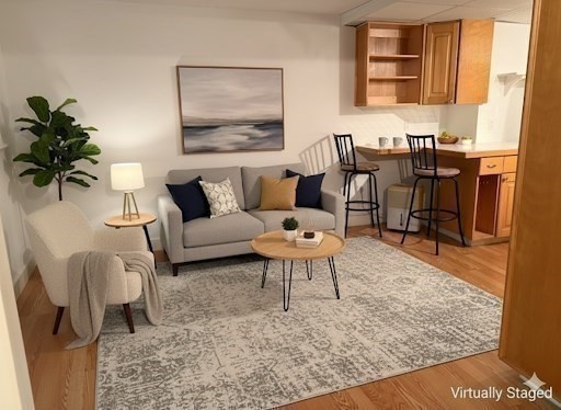526 Skunknet Road Barnstable, MA 02632 - Photo 19 of 20 a living room with furniture wooden floor and a table