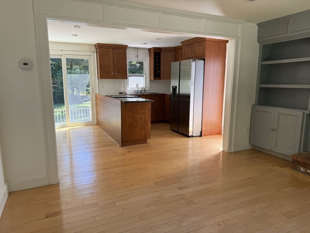 526 Skunknet Road Barnstable, MA 02632 - Photo 5 of 20 a view of kitchen with stainless steel appliances granite countertop a refrigerator and a sink