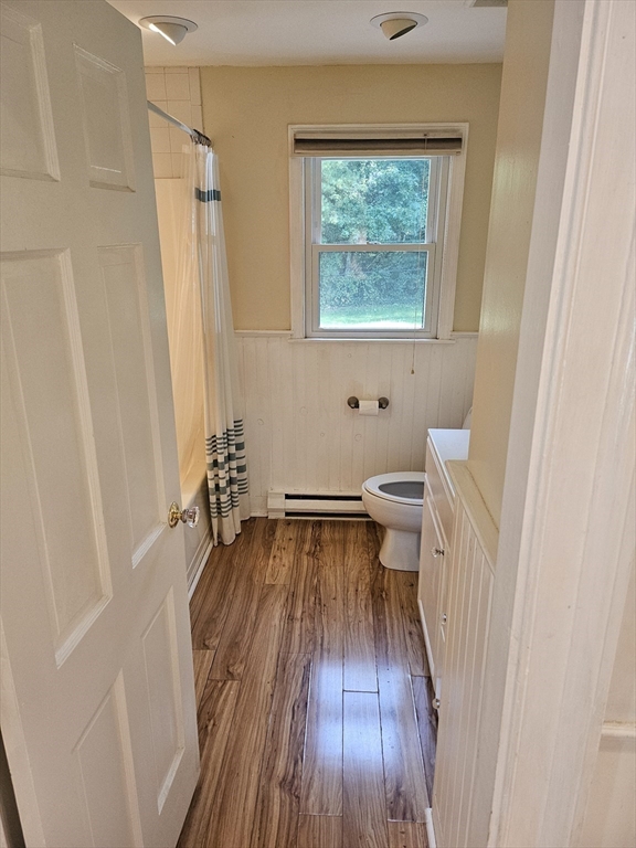 526 Skunknet Road Barnstable, MA 02632 - Photo 7 of 20 a view of a room with wooden floor and a window