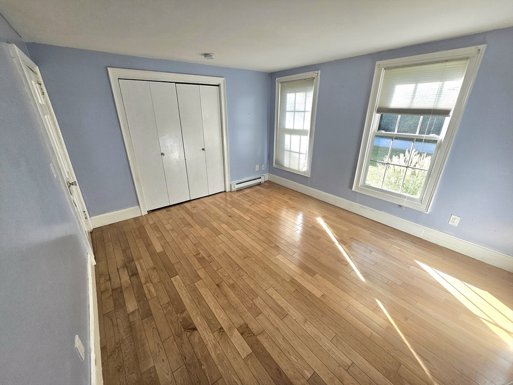 526 Skunknet Road Barnstable, MA 02632 - Photo 10 of 20 a view of an empty room and window