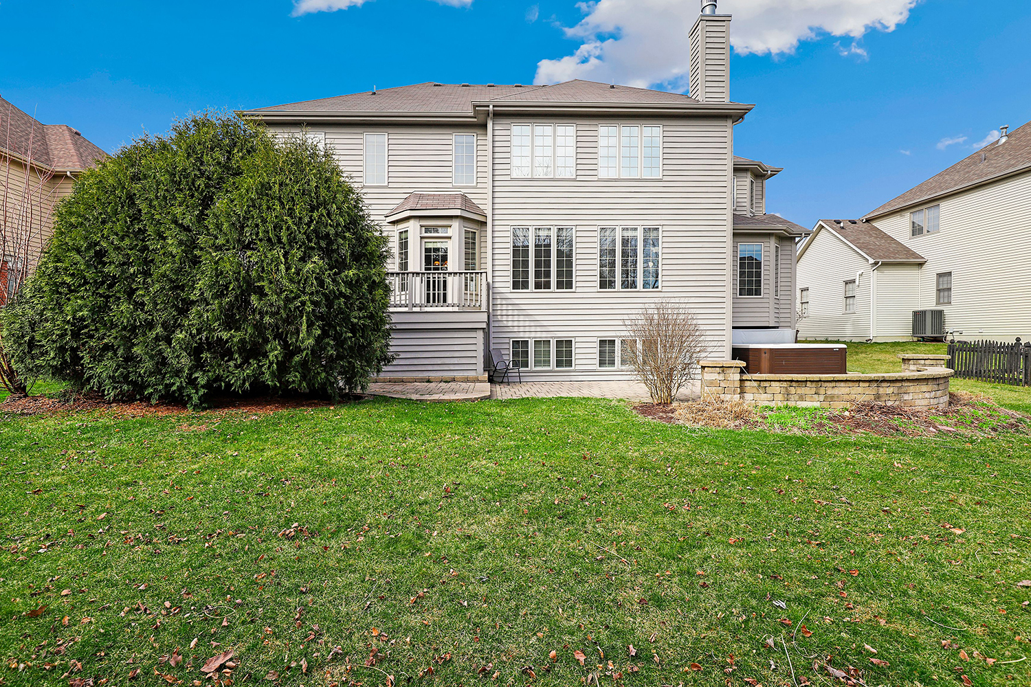 2524 Spartina Road Naperville, IL 60564 - Photo 36 of 41 a front view of a house with a garden