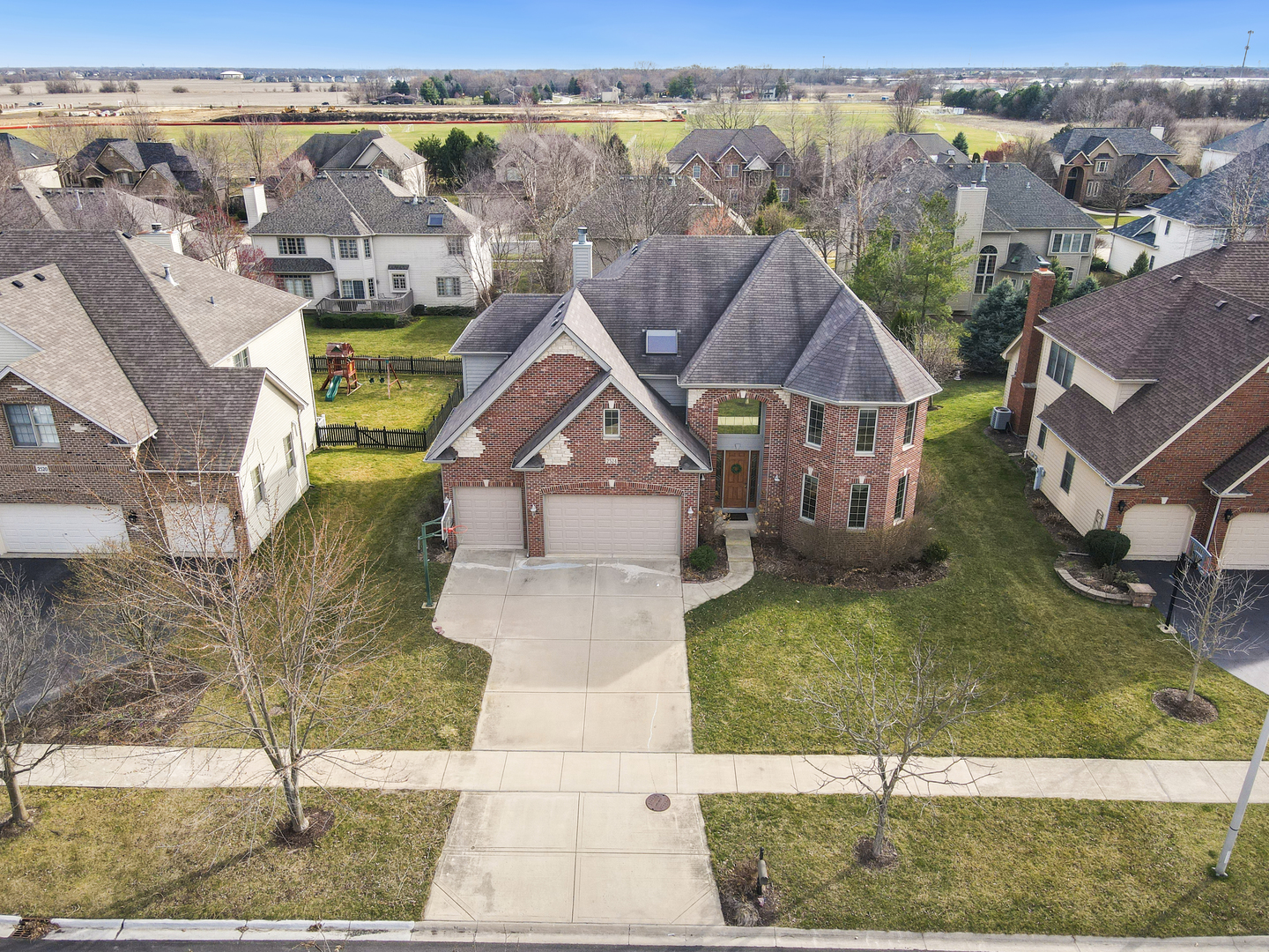 2524 Spartina Road Naperville, IL 60564 - Photo 40 of 41 an aerial view of a house with a yard