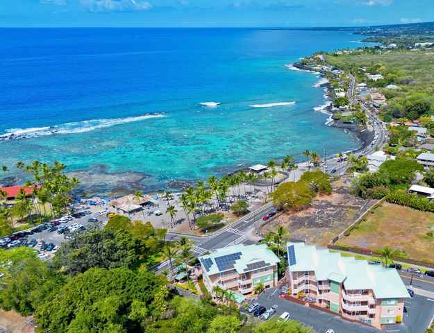 a view of a garden with an ocean