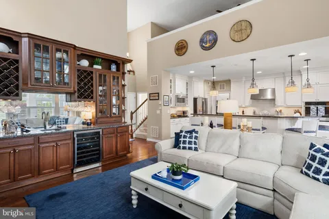 a kitchen with granite countertop a sink and a stove