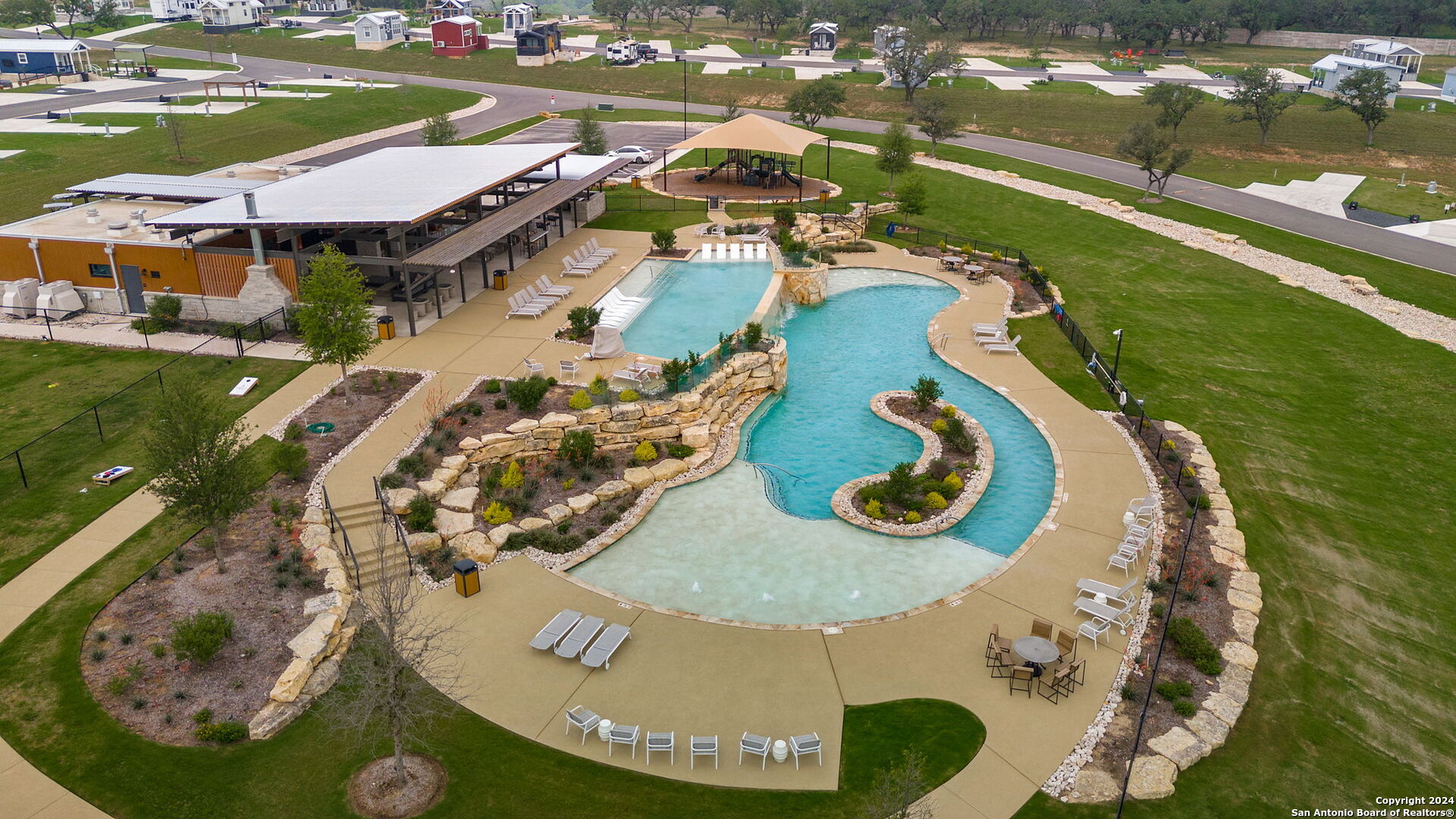 5386 Ranch Road 1376, Unit 372 Fredericksburg, TX 78624 - Photo 12 of 22 an aerial view of a house with yard swimming pool and outdoor seating
