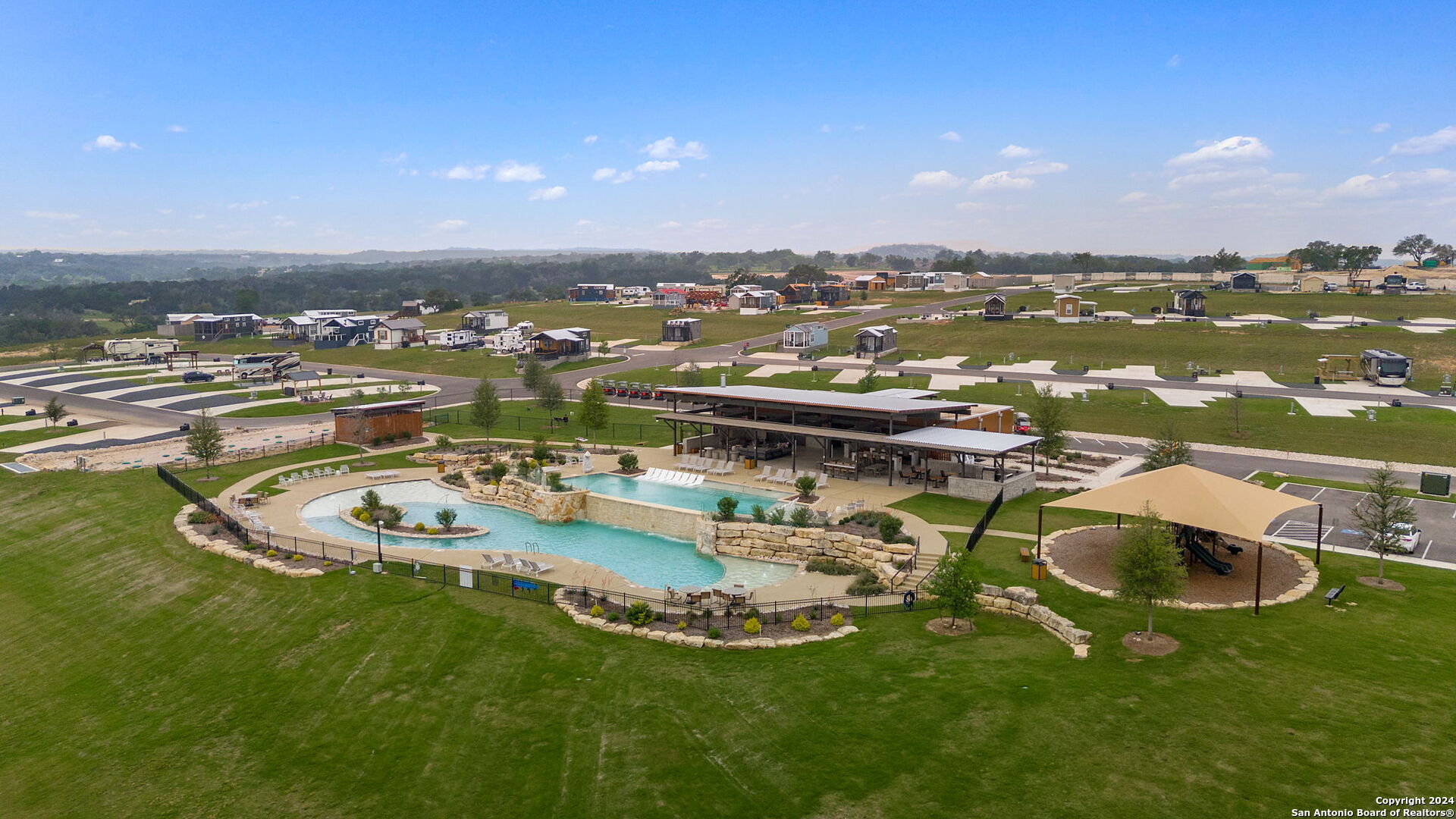 5386 Ranch Road 1376, Unit 372 Fredericksburg, TX 78624 - Photo 13 of 22 a view of a swimming pool with lounge chair