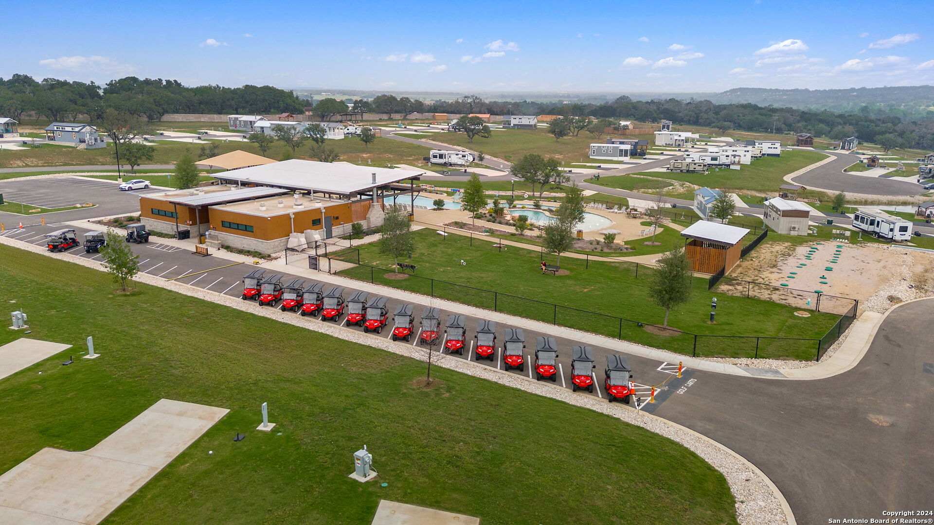 5386 Ranch Road 1376, Unit 372 Fredericksburg, TX 78624 - Photo 16 of 22 a view of a lake with a city