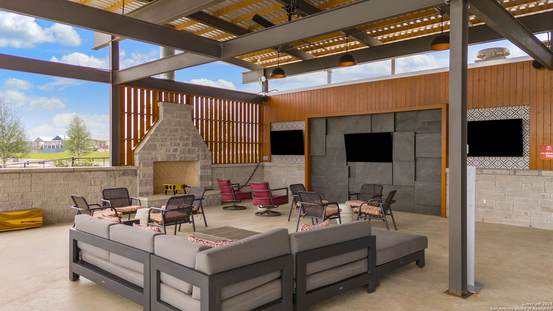 5386 Ranch Road 1376, Unit 372 Fredericksburg, TX 78624 - Photo 19 of 22 a view of a patio with a table and chairs