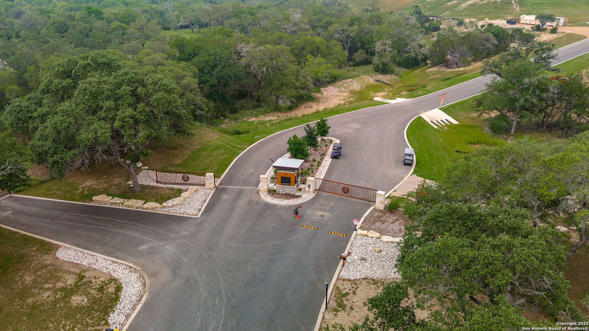 5386 Ranch Road 1376, Unit 372 Fredericksburg, TX 78624 - Photo 21 of 22 an aerial view of a house with a yard and lake view