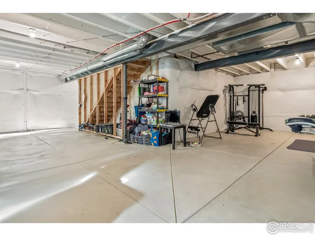 a view of a chairs and table in the patio