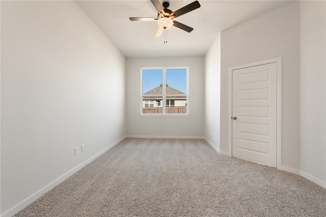 2220 Amber Court Bryan, TX 77807 - Photo 22 of 35 an empty room with closet and windows