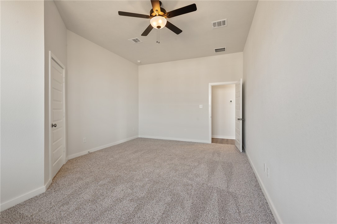 2220 Amber Court Bryan, TX 77807 - Photo 23 of 35 a view of a room with a ceiling fan