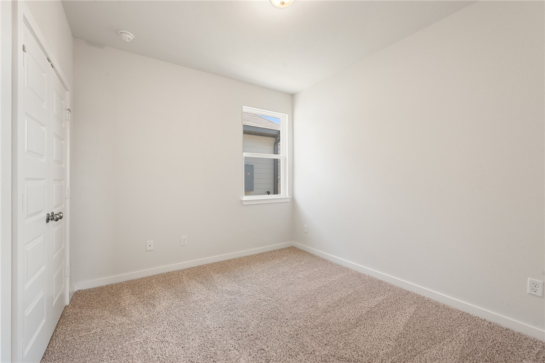 2220 Amber Court Bryan, TX 77807 - Photo 28 of 35 a view of an empty room with a window