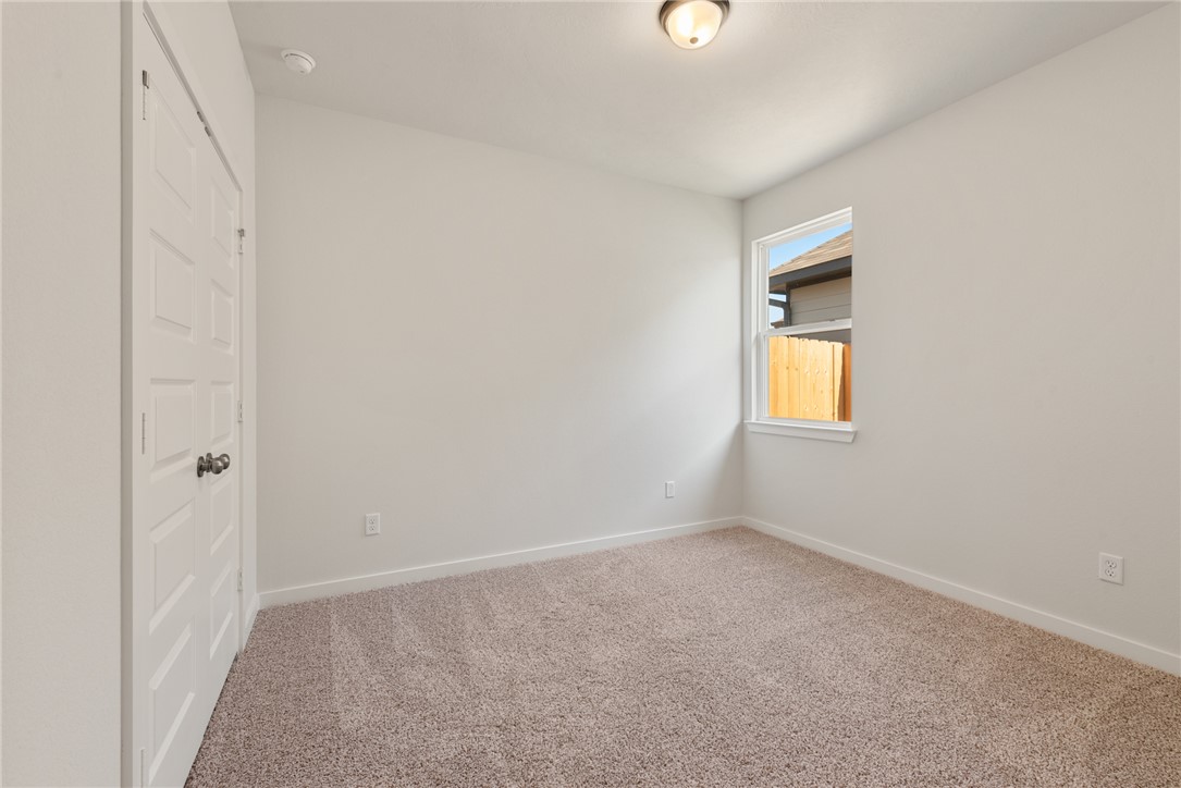 2220 Amber Court Bryan, TX 77807 - Photo 31 of 35 a view of an empty room with a window