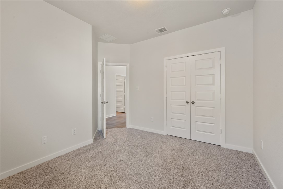 2220 Amber Court Bryan, TX 77807 - Photo 32 of 35 an empty room with closet area