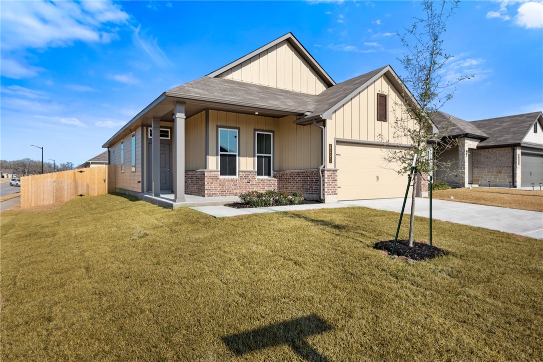 2220 Amber Court Bryan, TX 77807 - Photo 4 of 35 a front view of a house with garden