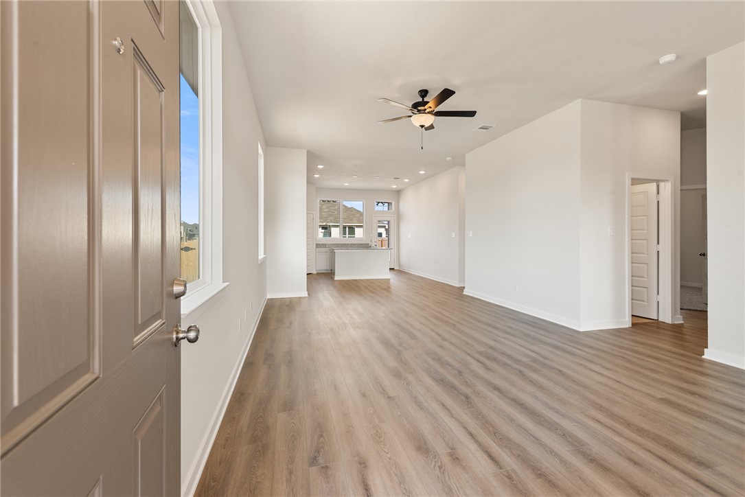 2220 Amber Court Bryan, TX 77807 - Photo 8 of 35 a view of empty room with wooden floor