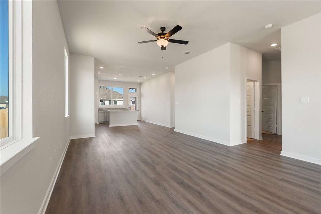 2220 Amber Court Bryan, TX 77807 - Photo 9 of 35 wooden floor in an empty room with a window