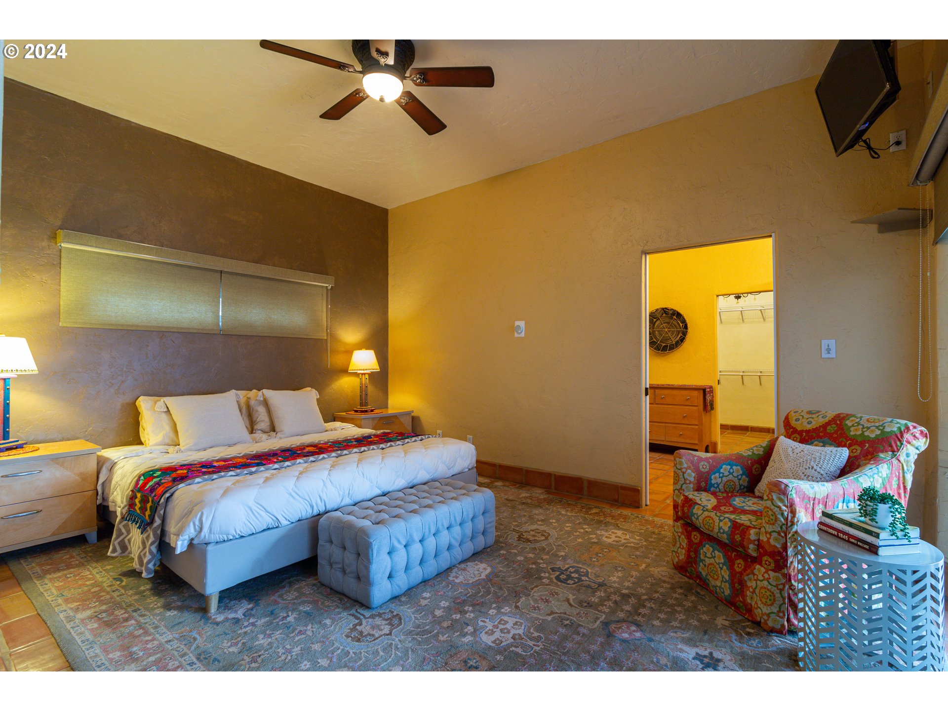 832 East Main Street Hermiston, OR 97838 - Photo 12 of 48 a bedroom with a bed and wooden floor