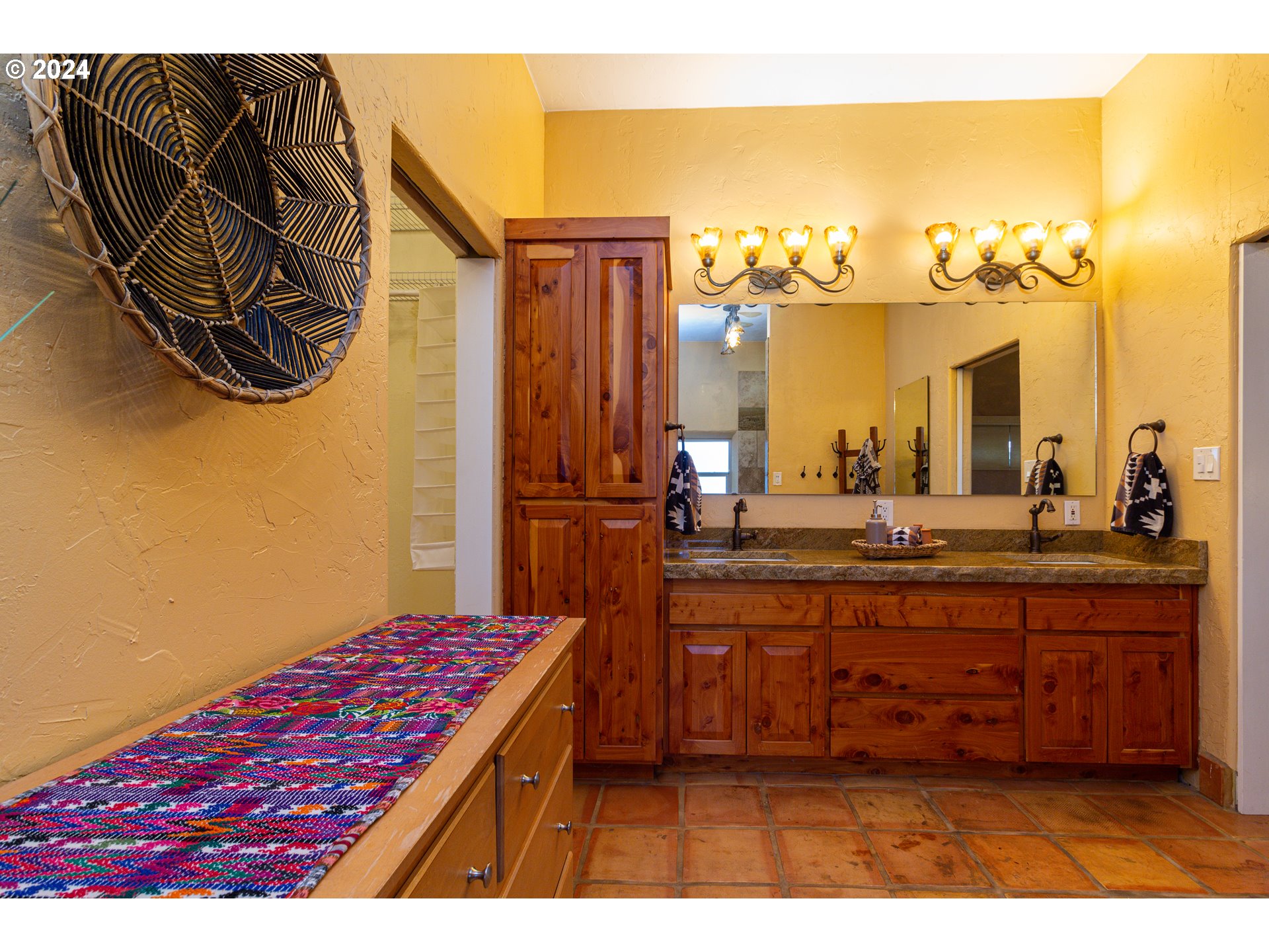 832 East Main Street Hermiston, OR 97838 - Photo 15 of 48 a bathroom with a sink a mirror and a shower