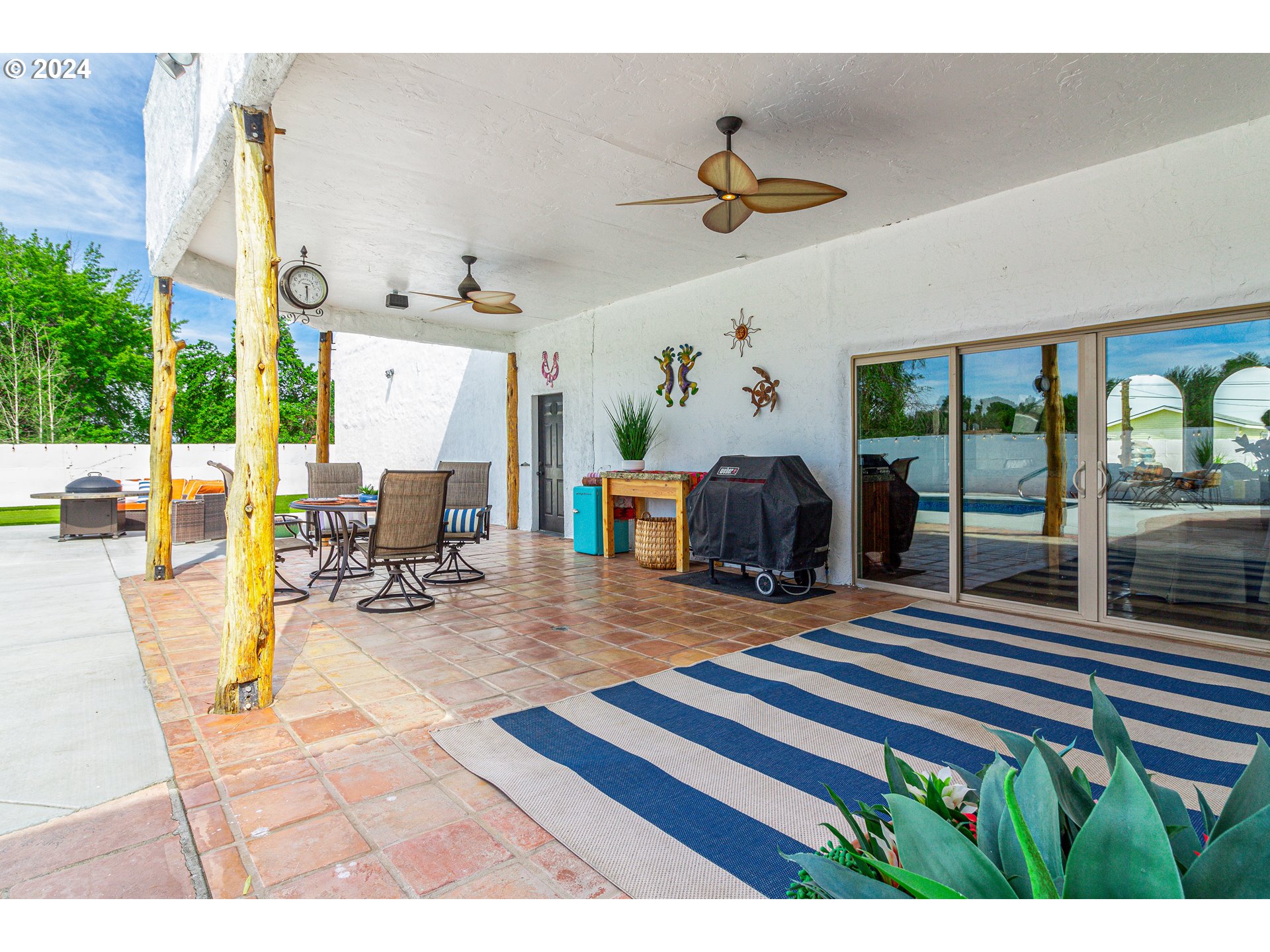 832 East Main Street Hermiston, OR 97838 - Photo 45 of 48 a view of a dining room with furniture a chandelier and wooden floor