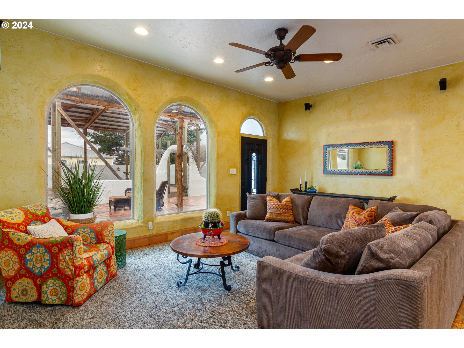 832 East Main Street Hermiston, OR 97838 - Photo 5 of 48 a living room with furniture and a large window