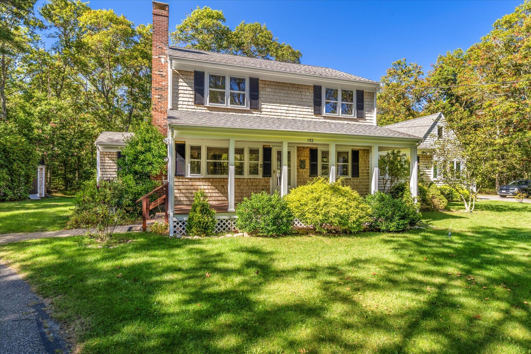 152 Wakeby Road Marstons Mills, MA 02648 - Photo 1 of 27 a view of a house with a yard