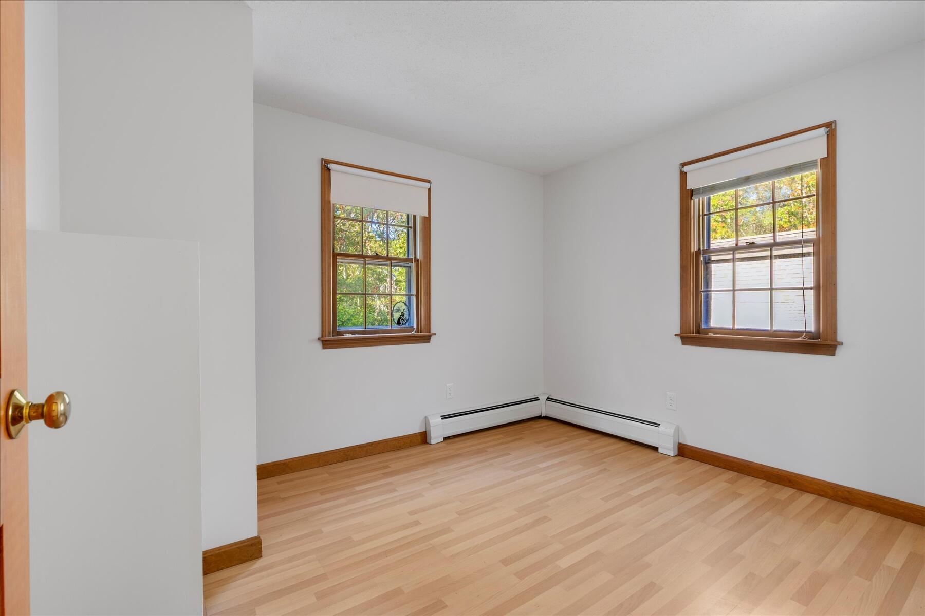 152 Wakeby Road Marstons Mills, MA 02648 - Photo 18 of 27 an empty room with a window