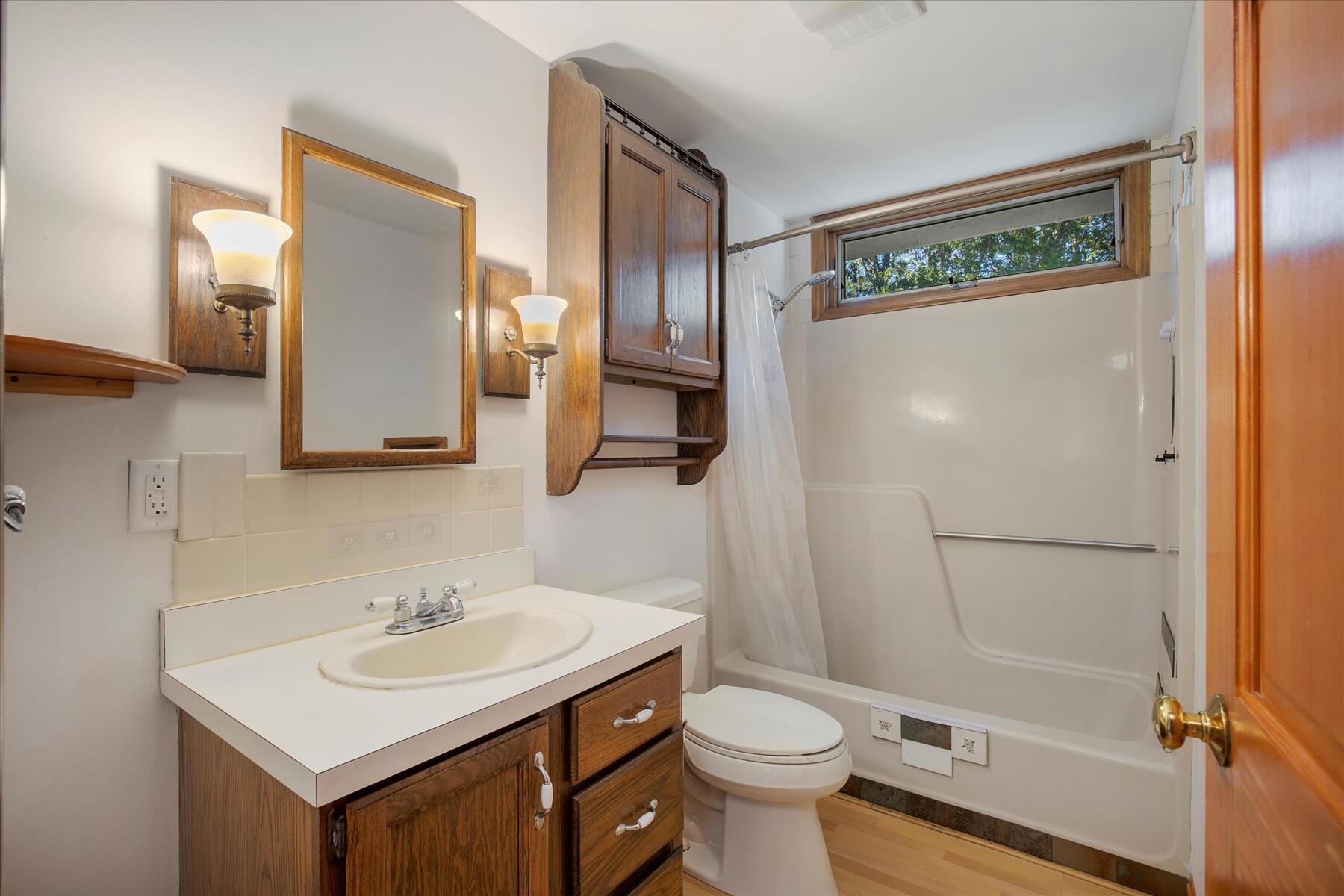 152 Wakeby Road Marstons Mills, MA 02648 - Photo 19 of 27 a bathroom with a sink toilet and shower