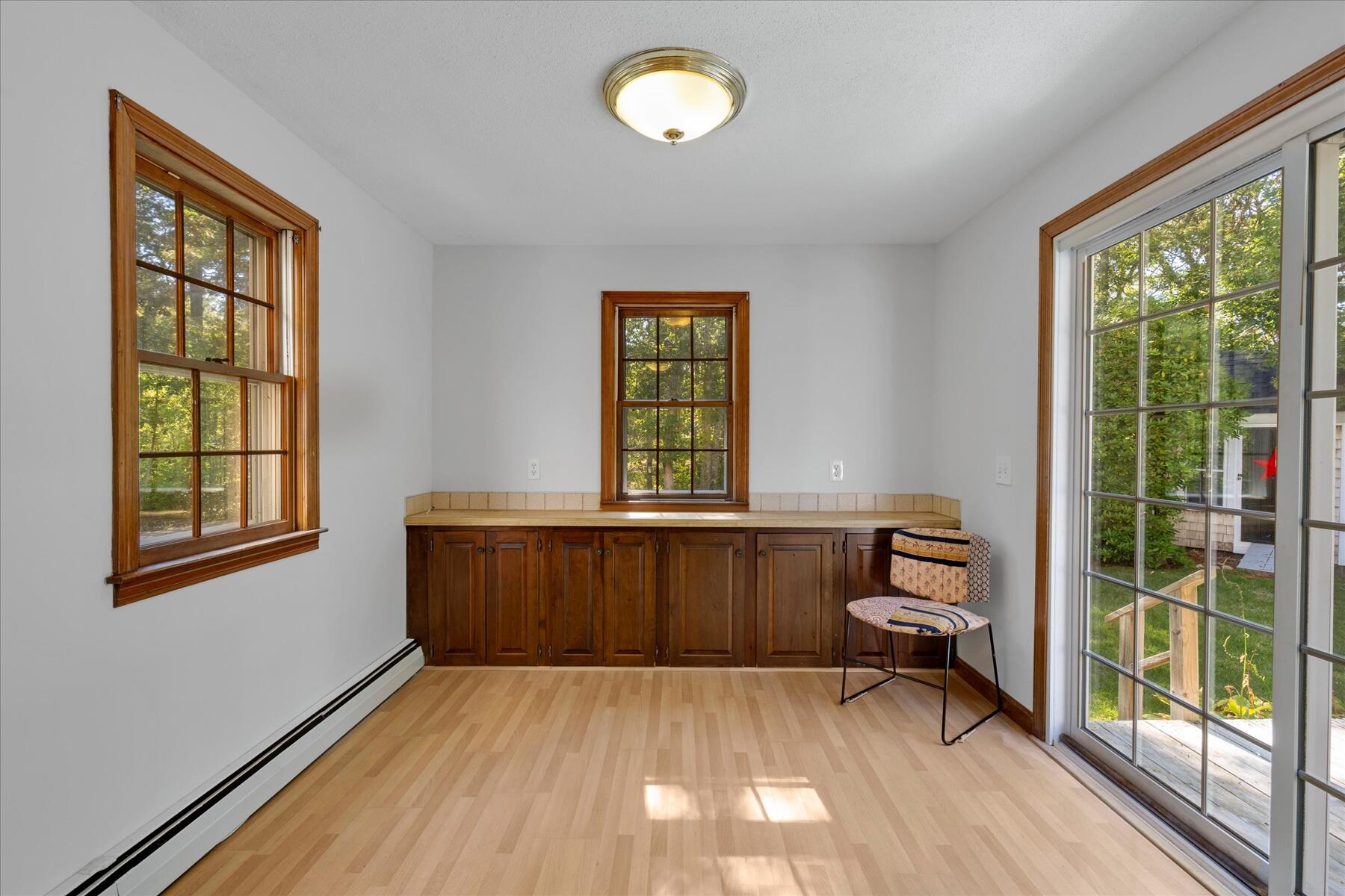 152 Wakeby Road Marstons Mills, MA 02648 - Photo 10 of 27 a view of livingroom with furniture wooden floor and a window