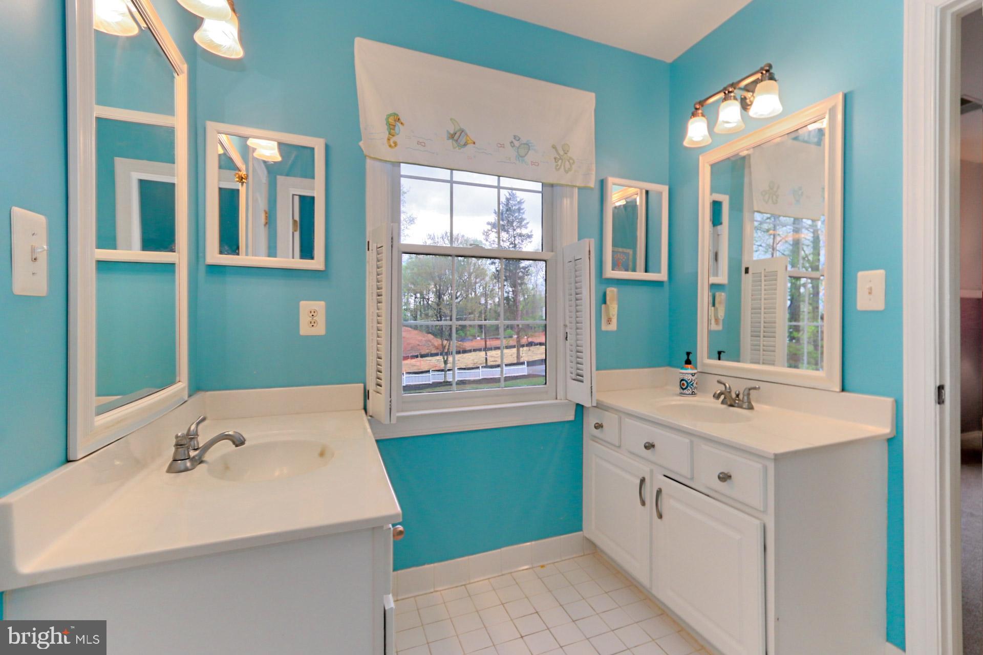 11804 Valley Road Fairfax, VA 22033 - Photo 22 of 49 Jack and Jill bathroom with double sinks