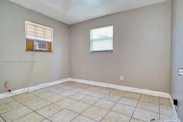 an empty room with windows