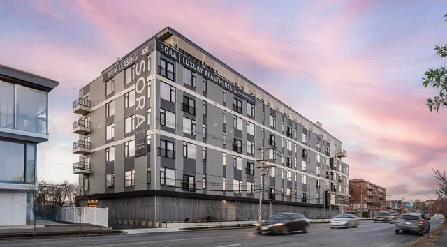 a car parked in front of a building