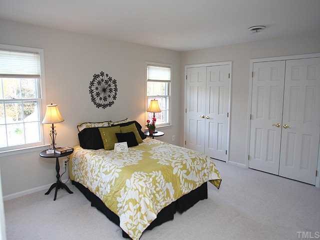 6808 Garrison Court Raleigh, NC 27613 - Photo 10 of 20 Large master suite has lots of light and double closets.