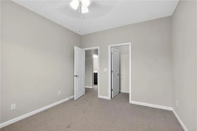 an empty room with a bathroom