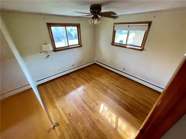 a view of empty room with windows