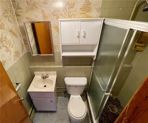 a bathroom with a sink and toilet