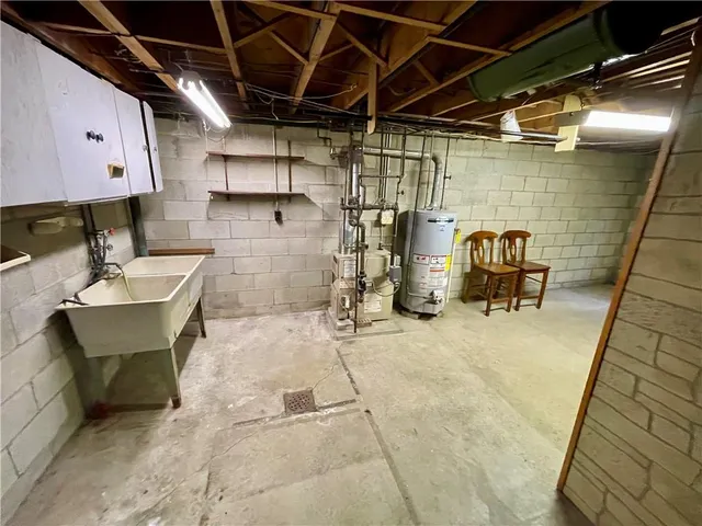 a view of a garage with table and chairs